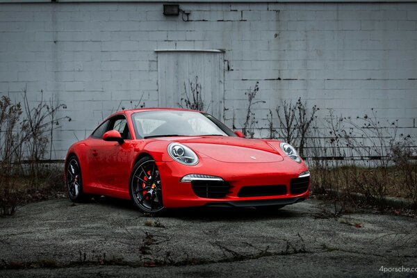 Red sporty Porsche on the street