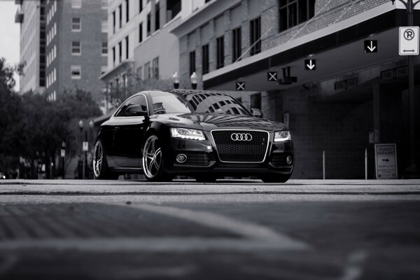 Black Audi on the street of the city. 