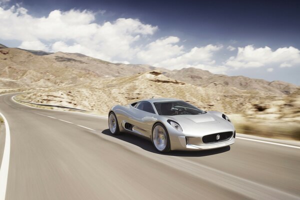 Stylish car on the road in the desert