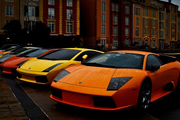 Sports cars near the sidewalk