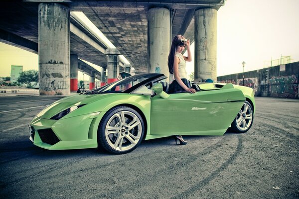 A girl in a stylish sports car 