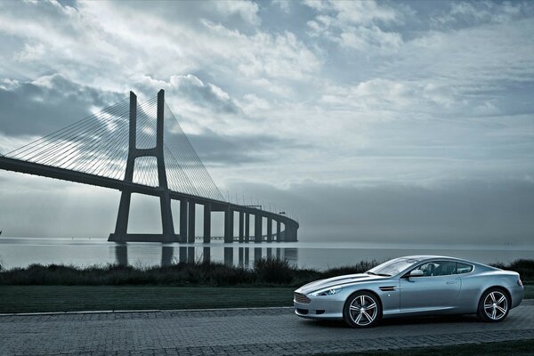 Grey sports car at the bridge