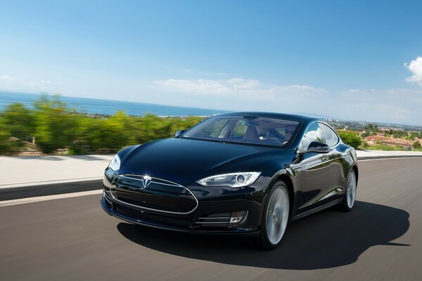 Cool black Tesla on the road