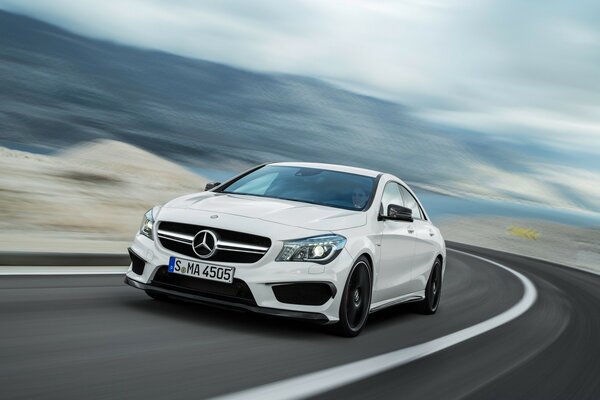 Beautiful white Mercedes on the road