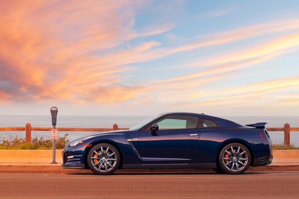 Beautiful blue car on vanilla sky background