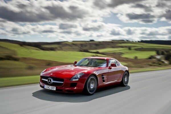 Red, cool car, at high speed