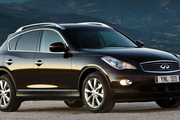 Beautiful, black car on a landscape background