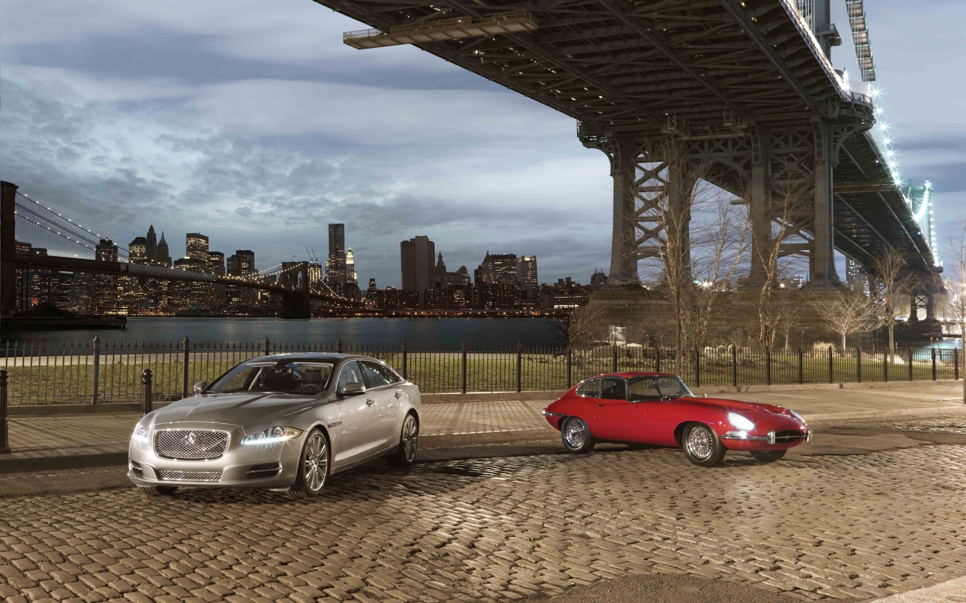 cars travel vehicle water car transportation system beach bridge city sky sunset outdoors light sea architecture road ocean landscape building