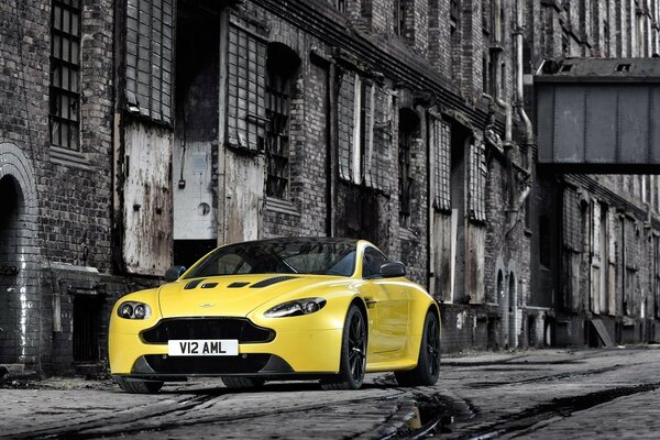 Yellow sports car on the city street