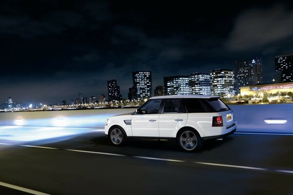 A car on a brightly lit road