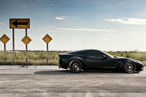 Car on asphalt in the steppe