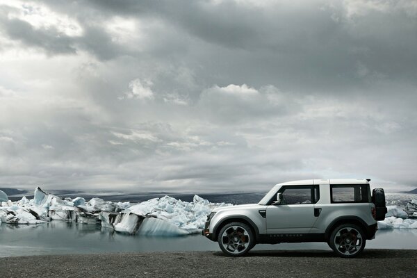 A white car on the background of an ice drift