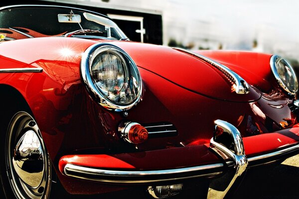 Retro car nearby. Red retro car