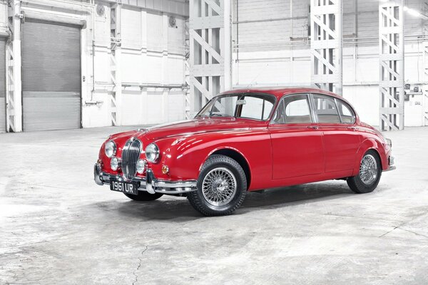 Red retro car in the garage