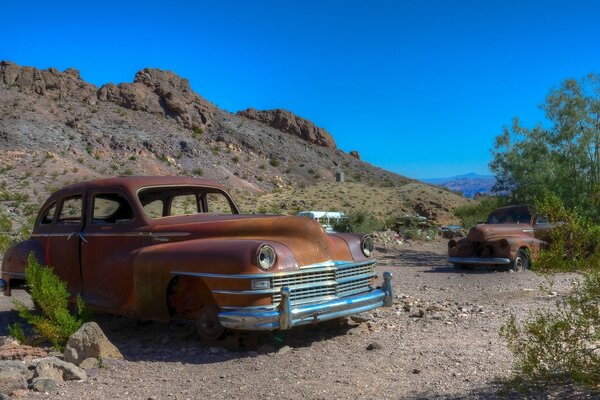 Abandoned retro cars in the desert