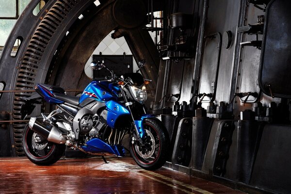 Blue sports bike in the garage