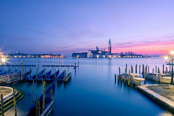 City. Pier. Clean water. Beautiful sunset. Lanterns. E