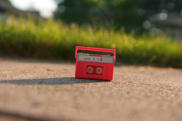 An old audio recorder, audio cassette, road music