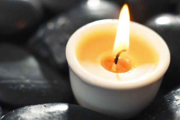 Still life of candles and stones