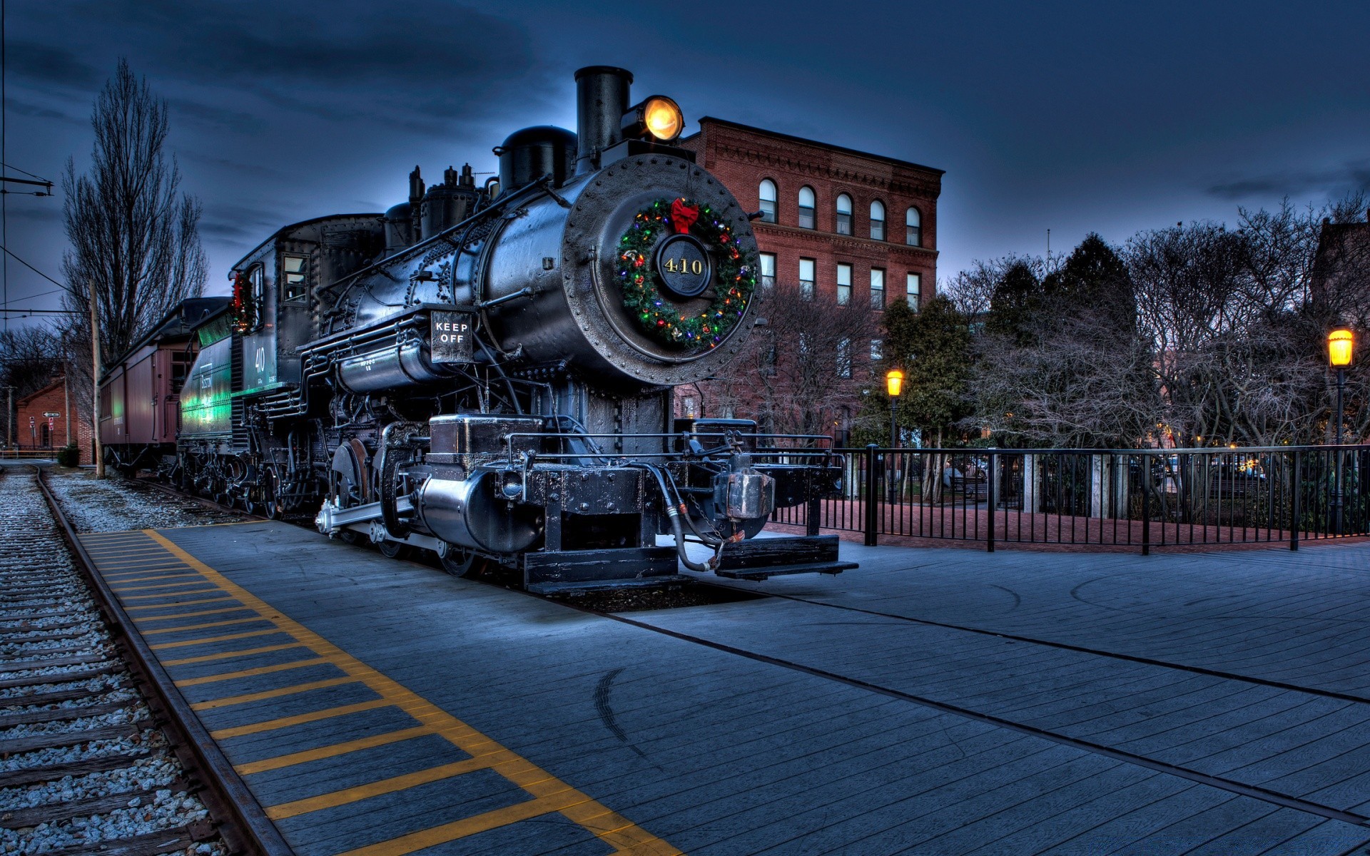 trains travel train street railway city light urban transportation system winter snow outdoors