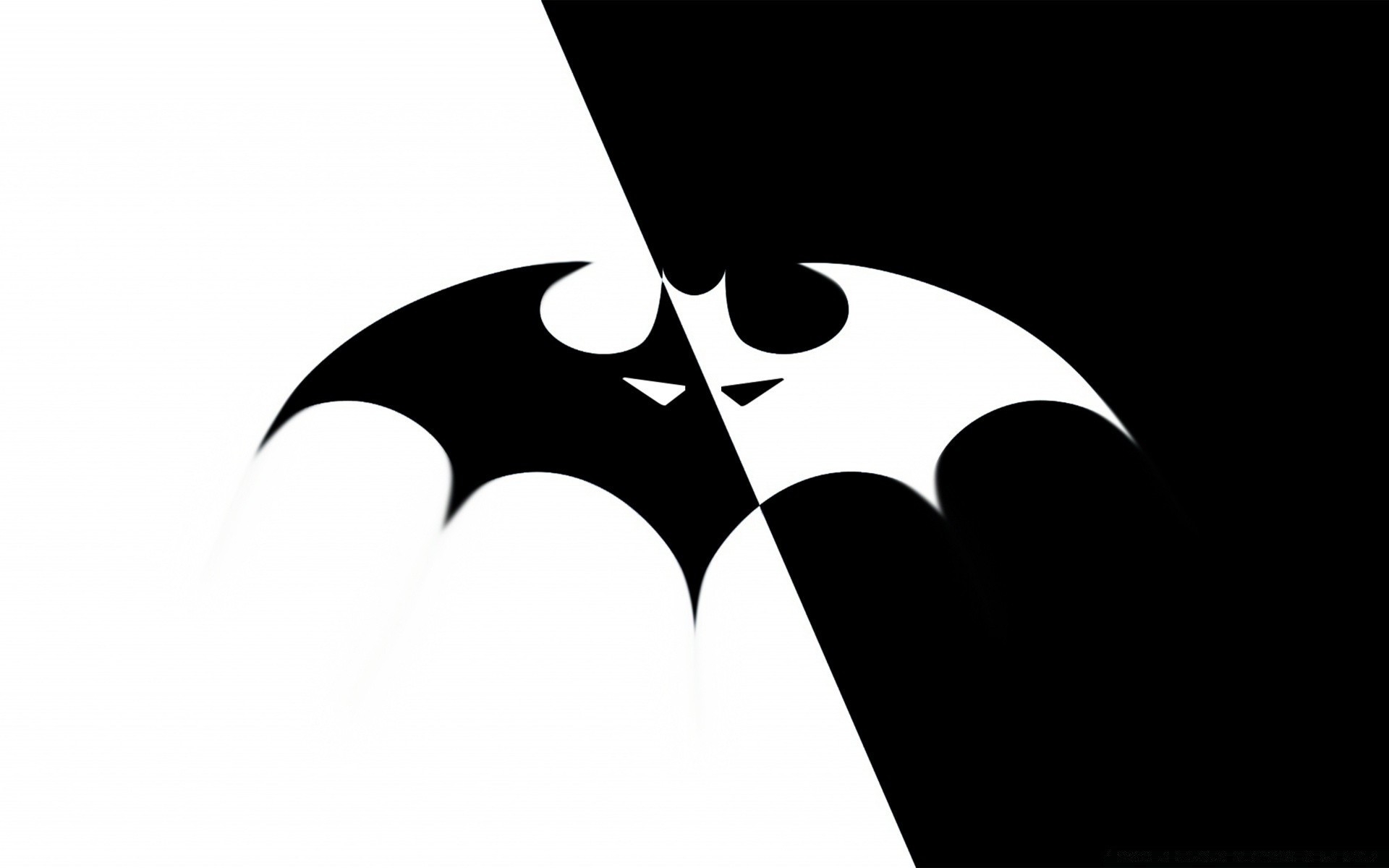 Black and white Batman symbol on the desktop wallpaper