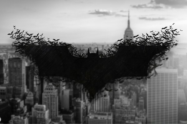 Emblema di Batman sullo sfondo della città