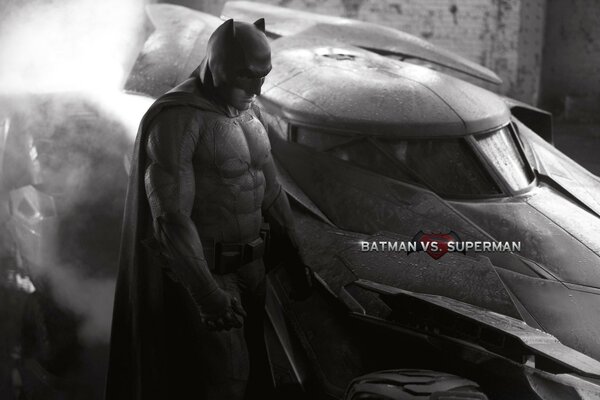 Batman et voiture sur fond noir