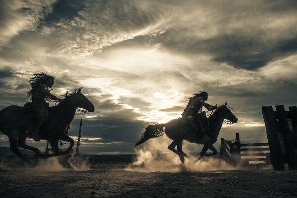 Caballo jinete polvo arena