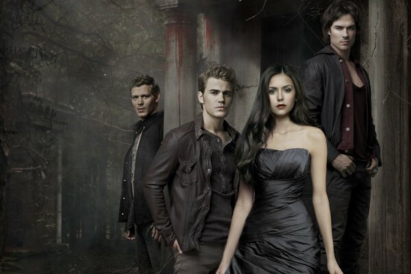 Nina Dobrev surrounded by actors from The Vampire Diaries 