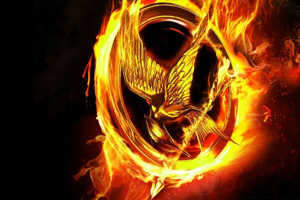 Mockingjay on the background of fire