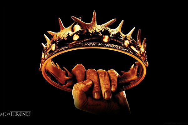 A dirty hand holds the crown