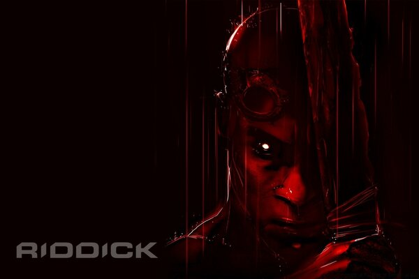 A monster with a knife. A red man on a dark background