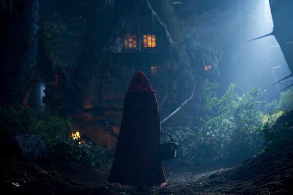 Image of a girl in a red raincoat