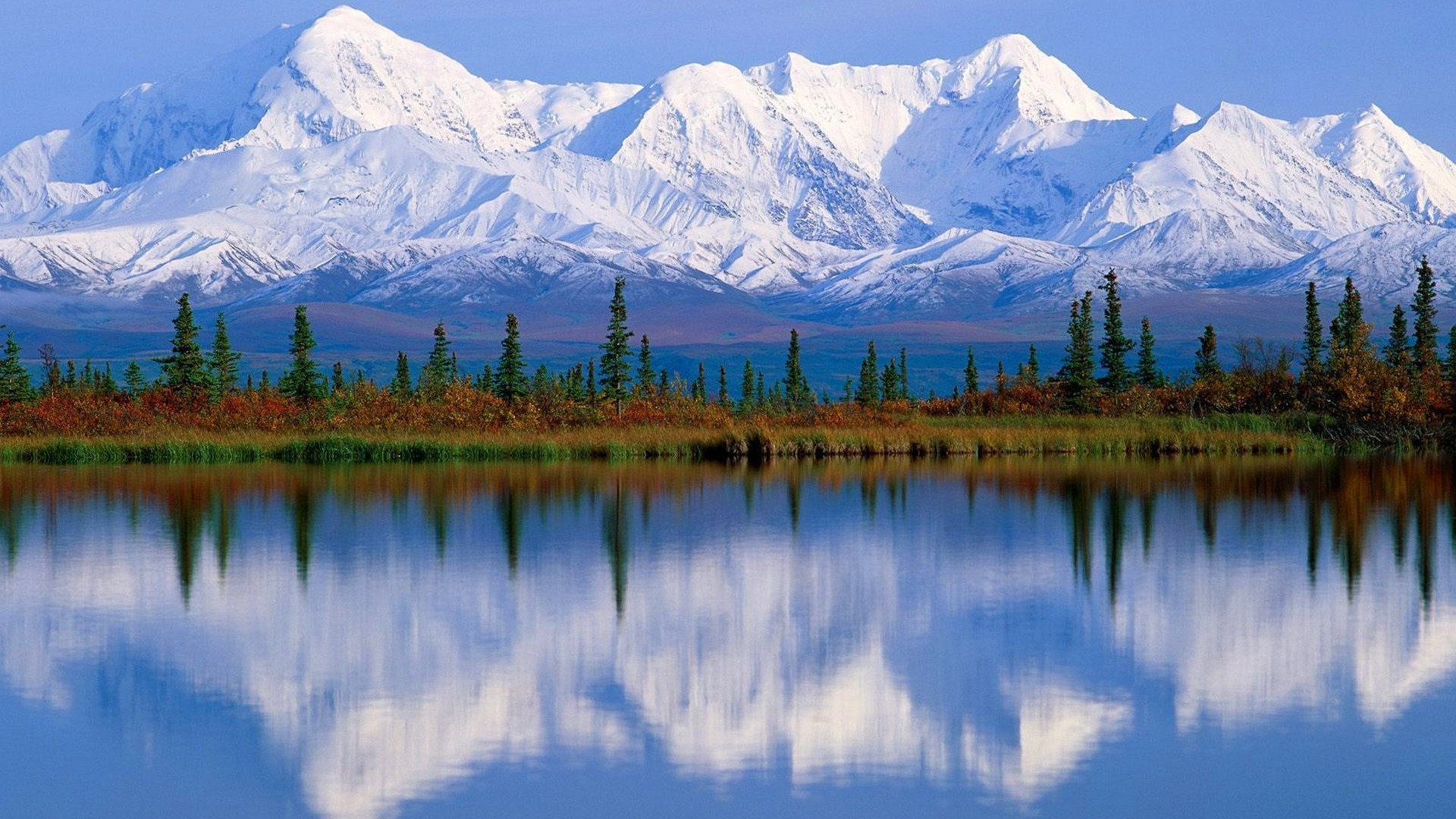 montañas nieve montañas lago agua escénico cielo viajes paisaje majestuoso madera salvaje