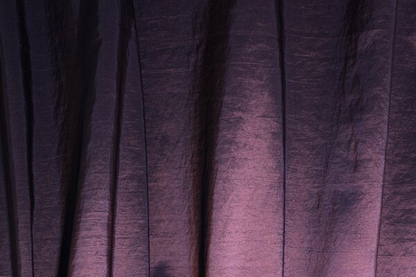 Purple curtains in a fold lighting