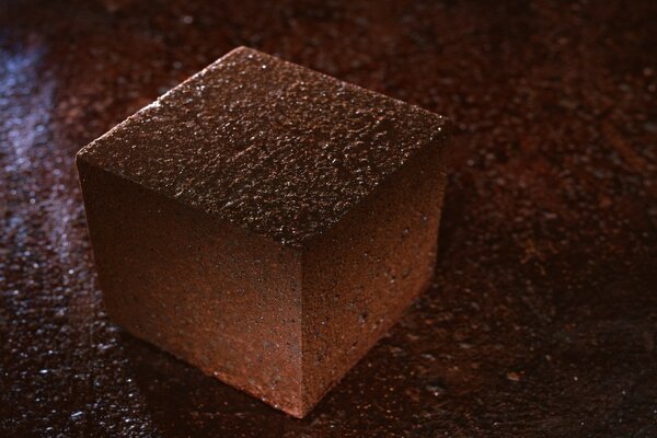 Cube of dark delicious chocolate
