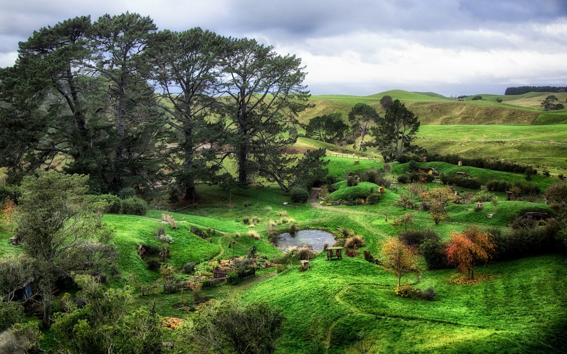 the hobbit landscape nature grass tree wood sky outdoors travel hill scenic countryside rural field hayfield sight summer scenery environment flora