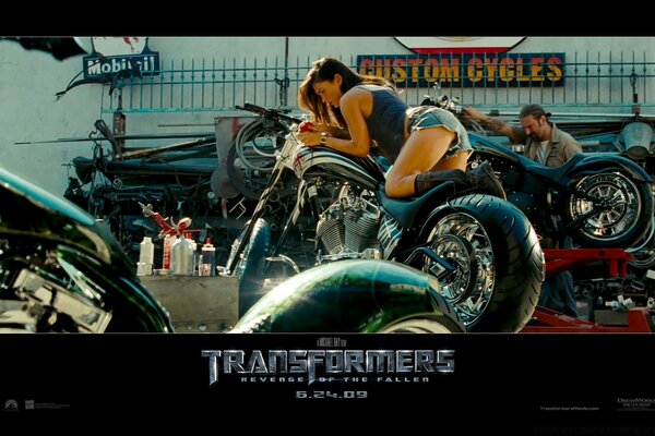 A fragment with a girl on a motorcycle from transformers