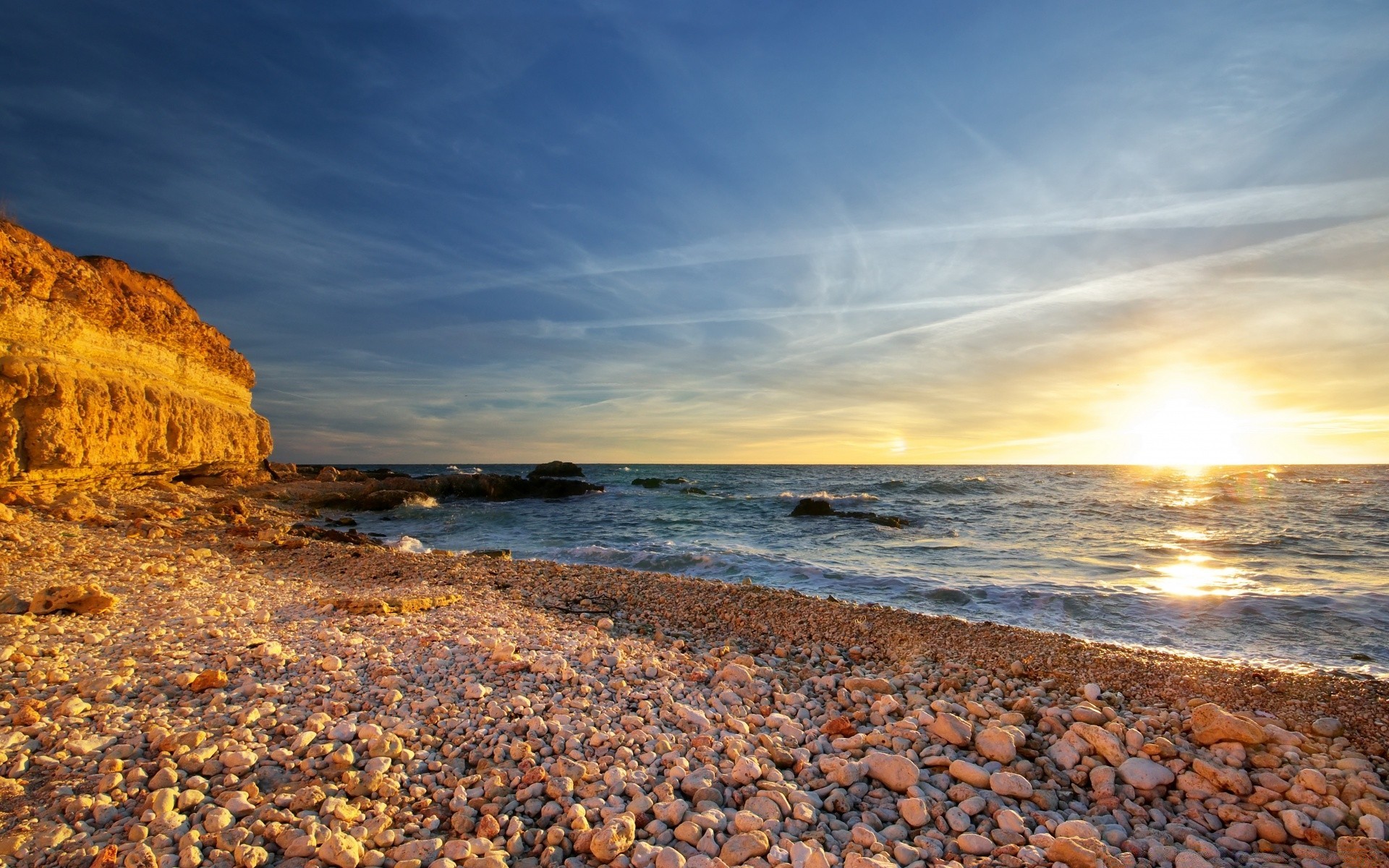 sea and ocean water sunset beach sea seashore landscape sky nature travel ocean sun dusk dawn rock sand seascape evening