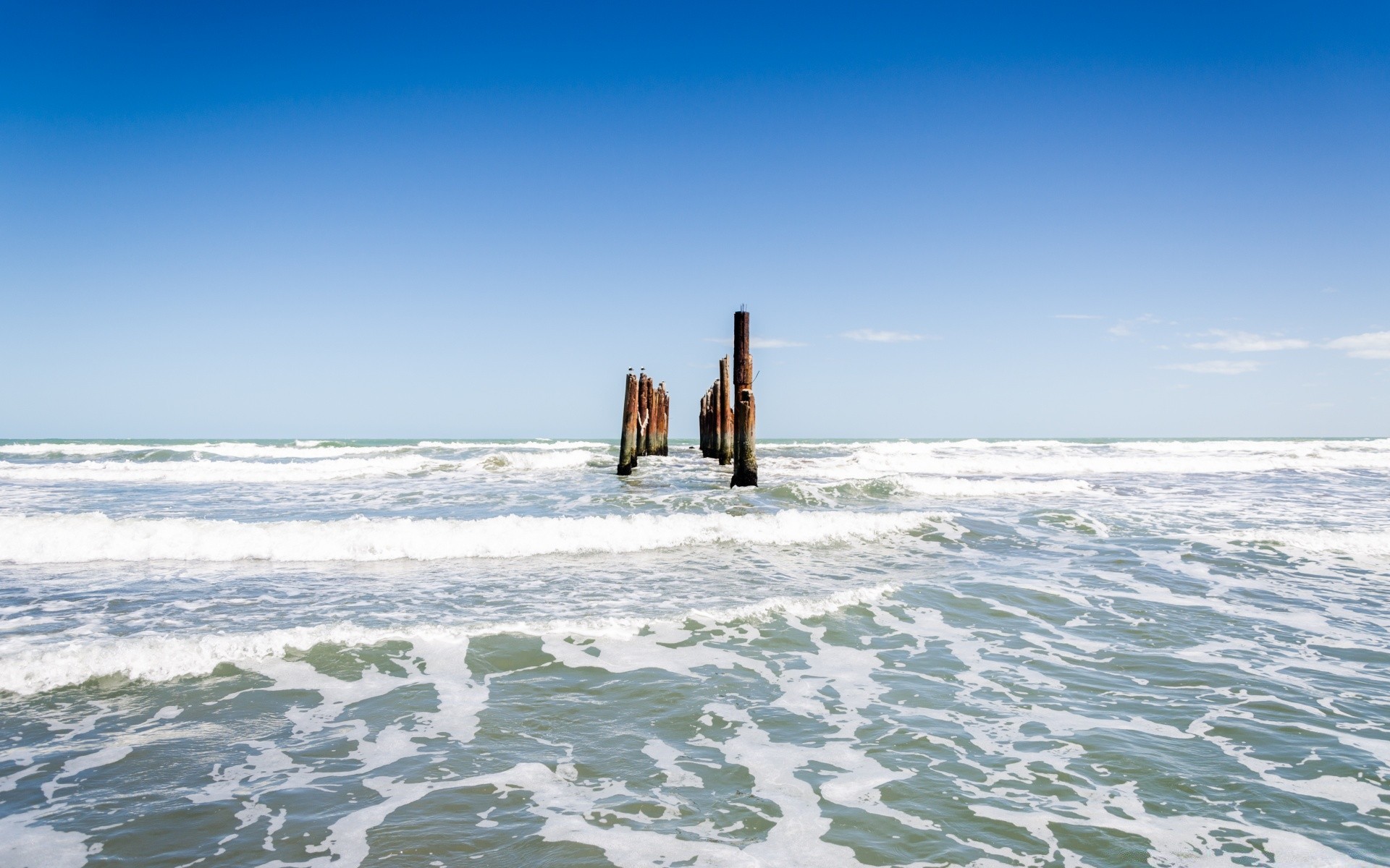 sea and ocean water sea ocean beach sky travel seashore surf landscape seascape wave outdoors dawn nature vacation