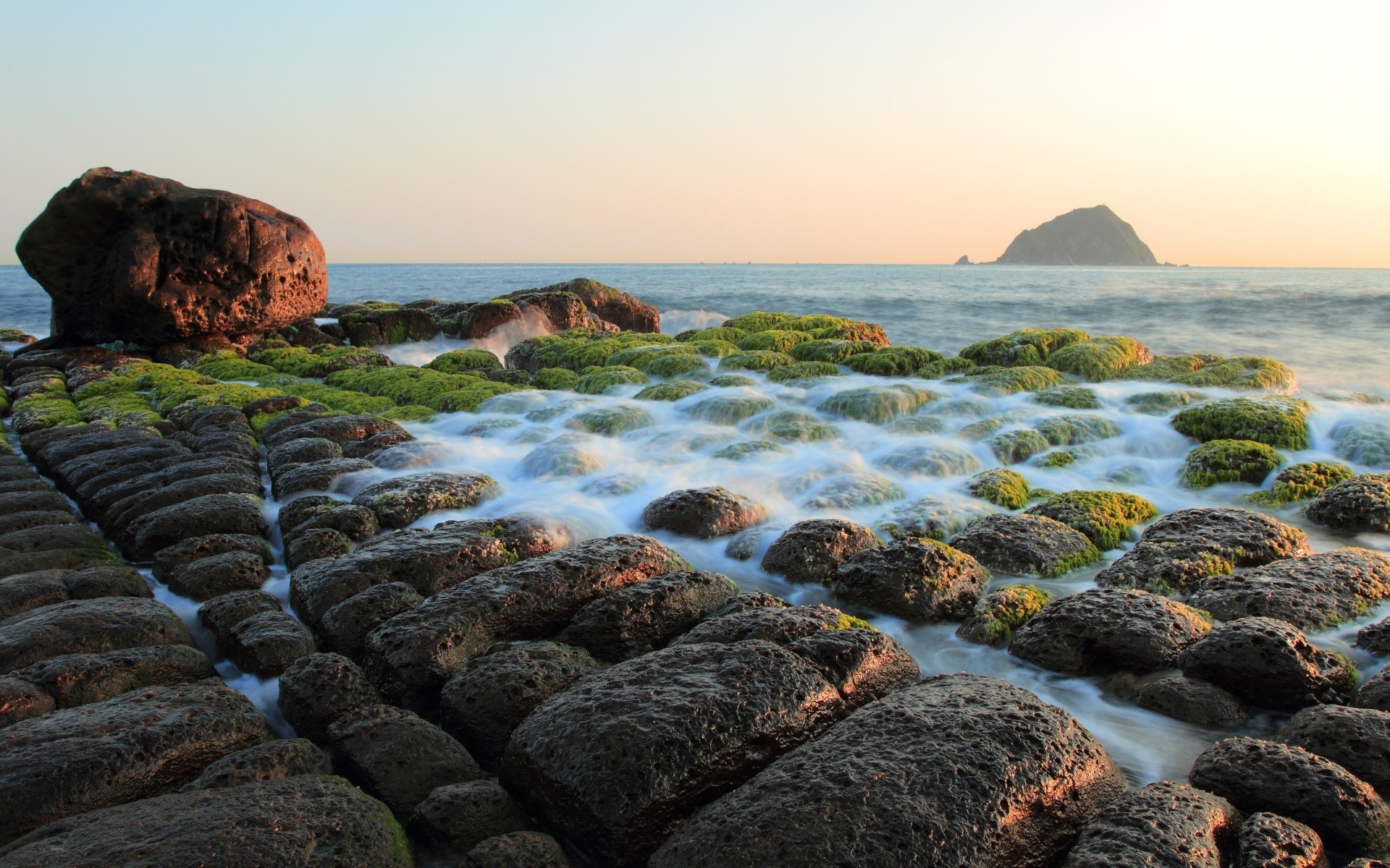 sea and ocean water sea seashore beach ocean rock seascape landscape sunset travel sky nature evening shore scenic bay surf island