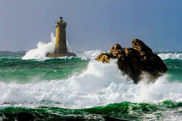 The raging element of the ocean lighthouse