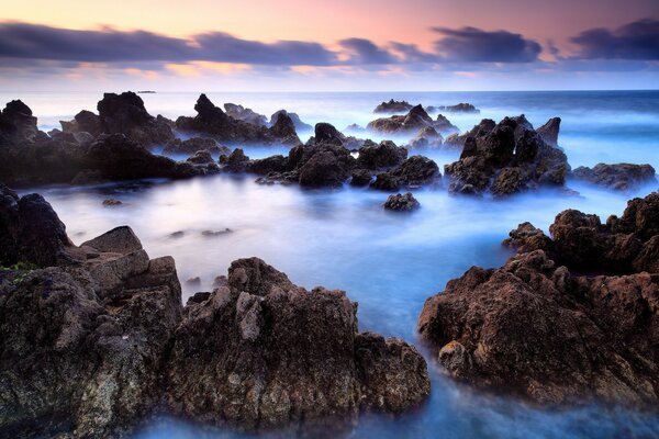 Low clouds. The Blue Sea