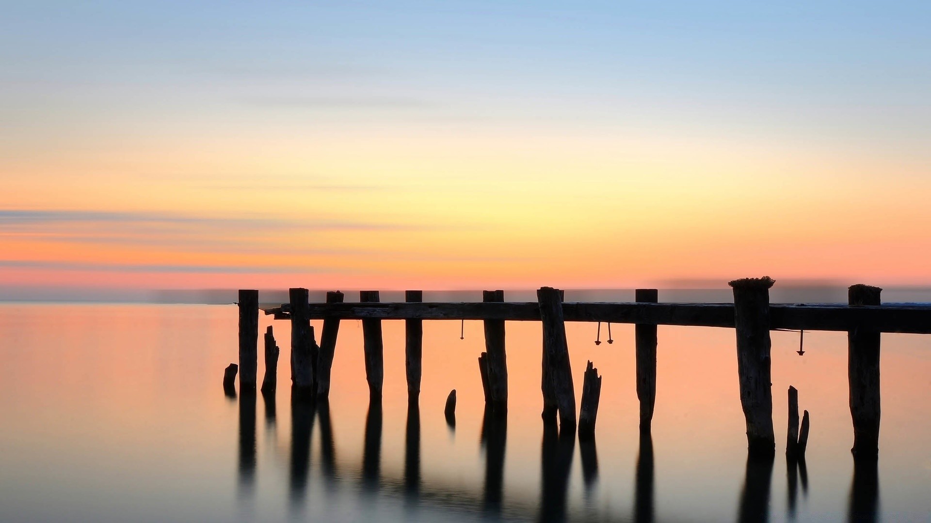 sea and ocean sunset dawn water sun sky outdoors dusk beach sea reflection pier bridge nature composure travel evening summer ocean fair weather