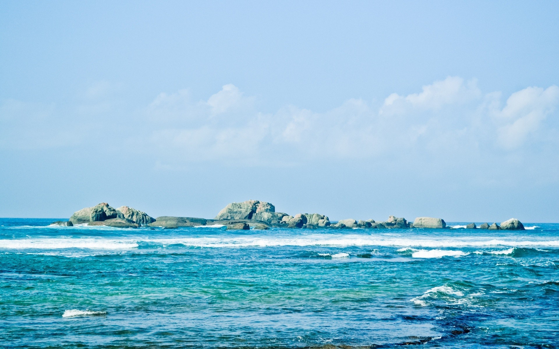 mer et océan eau mer voyage plage été ciel océan mer île paysage sable à l extérieur nature tropical soleil vacances paysage beau temps vague