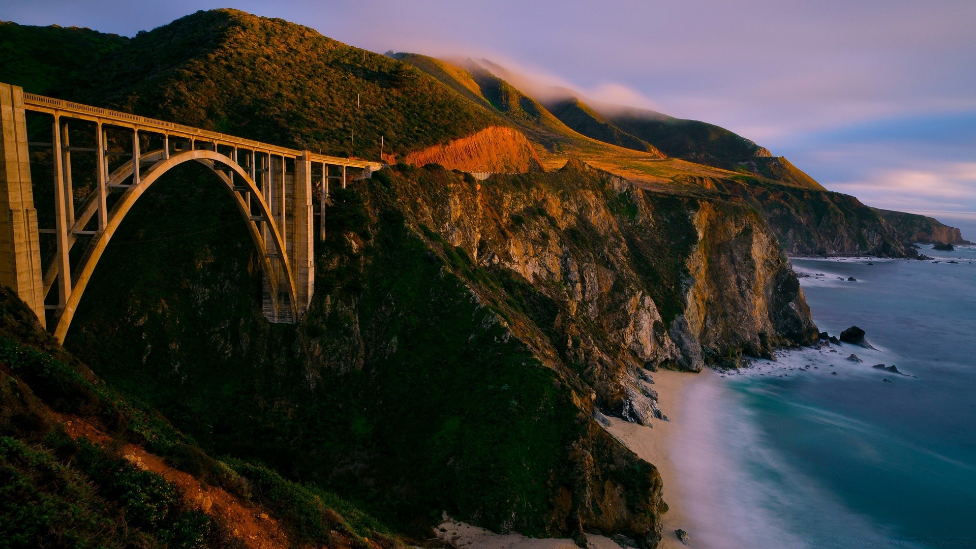 sea and ocean water landscape travel mountain rock seashore bridge nature river outdoors ocean sea scenic sky daylight beach sunset