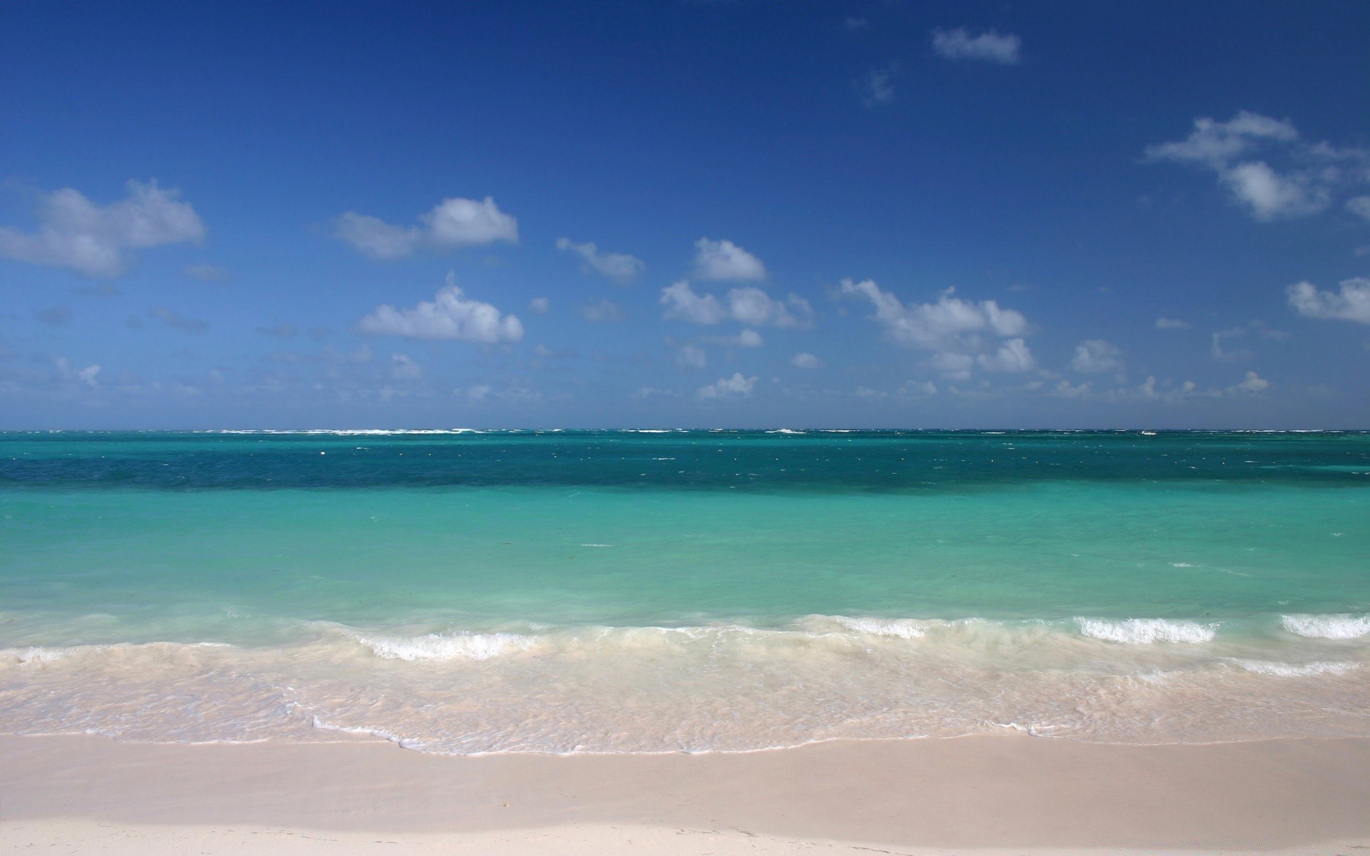 mer et océan eau sable voyage été plage tropical ciel beau temps soleil nature idyllique paysage surf mer paysage chaud en plein air océan