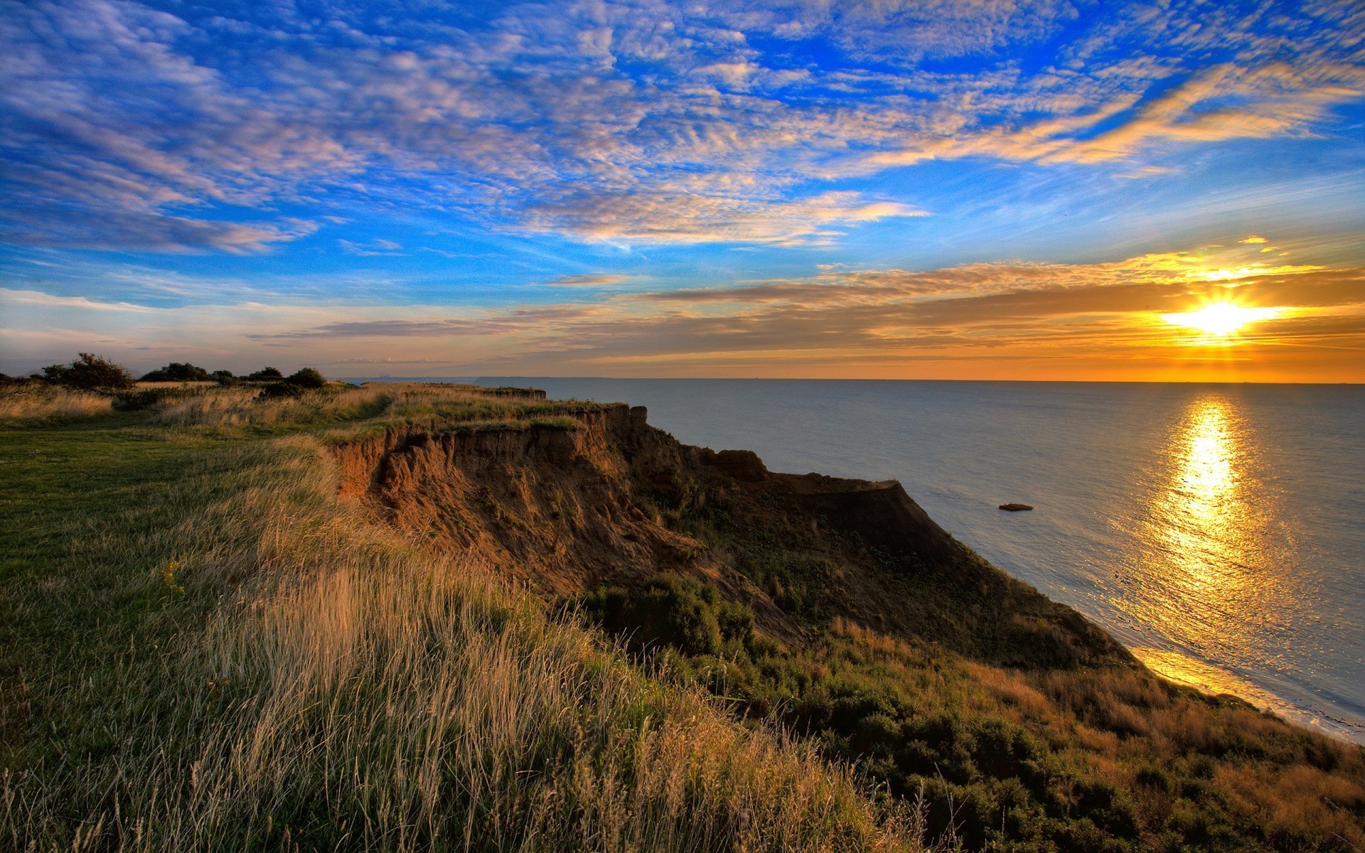 sea and ocean sunset water landscape sky dawn sea beach nature seashore travel dusk ocean sun evening