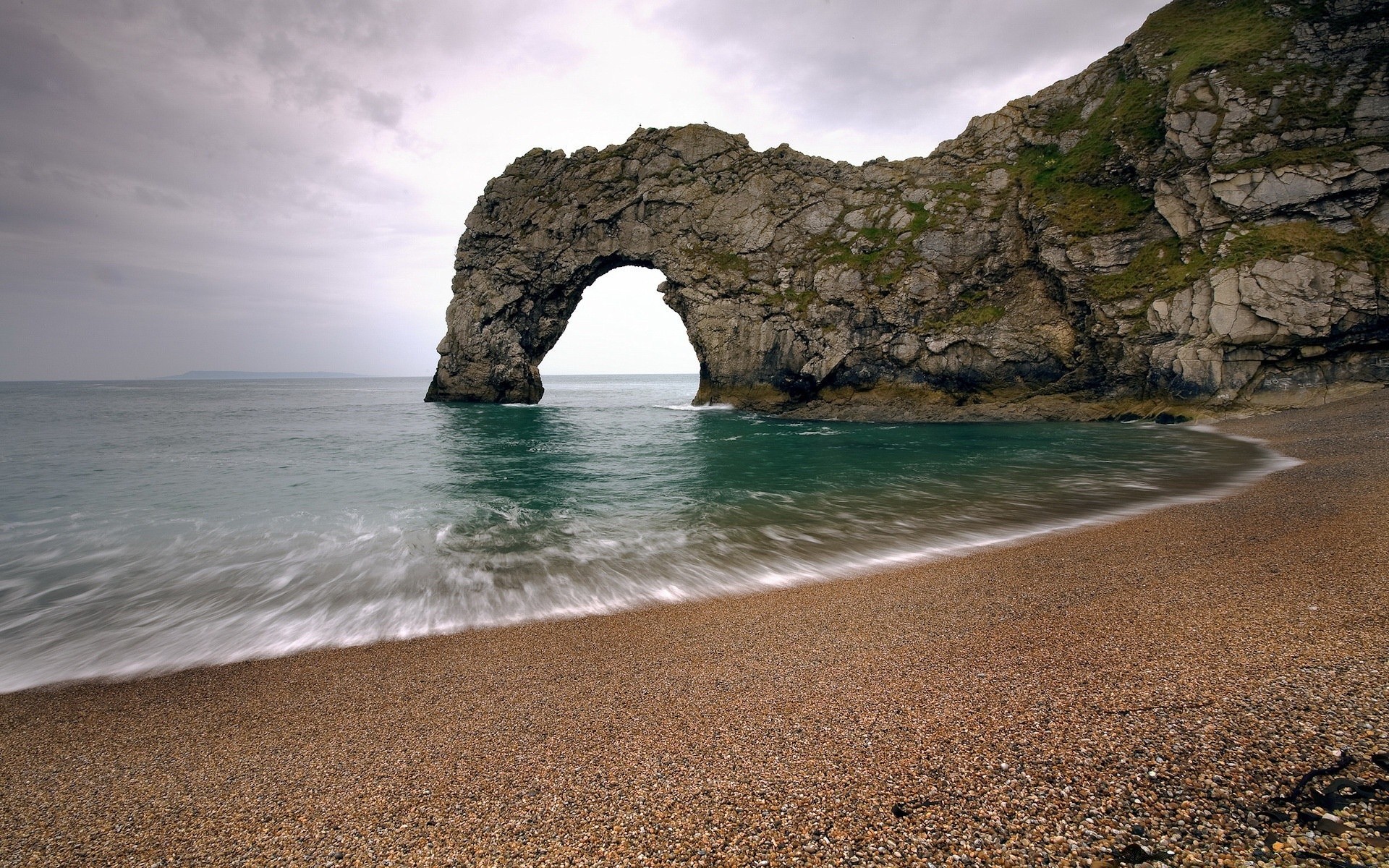 sea and ocean beach seashore sea ocean water landscape travel seascape rock island nature sand sky