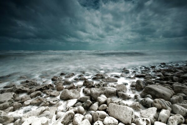 The pebble beach is waiting for the next wave to come